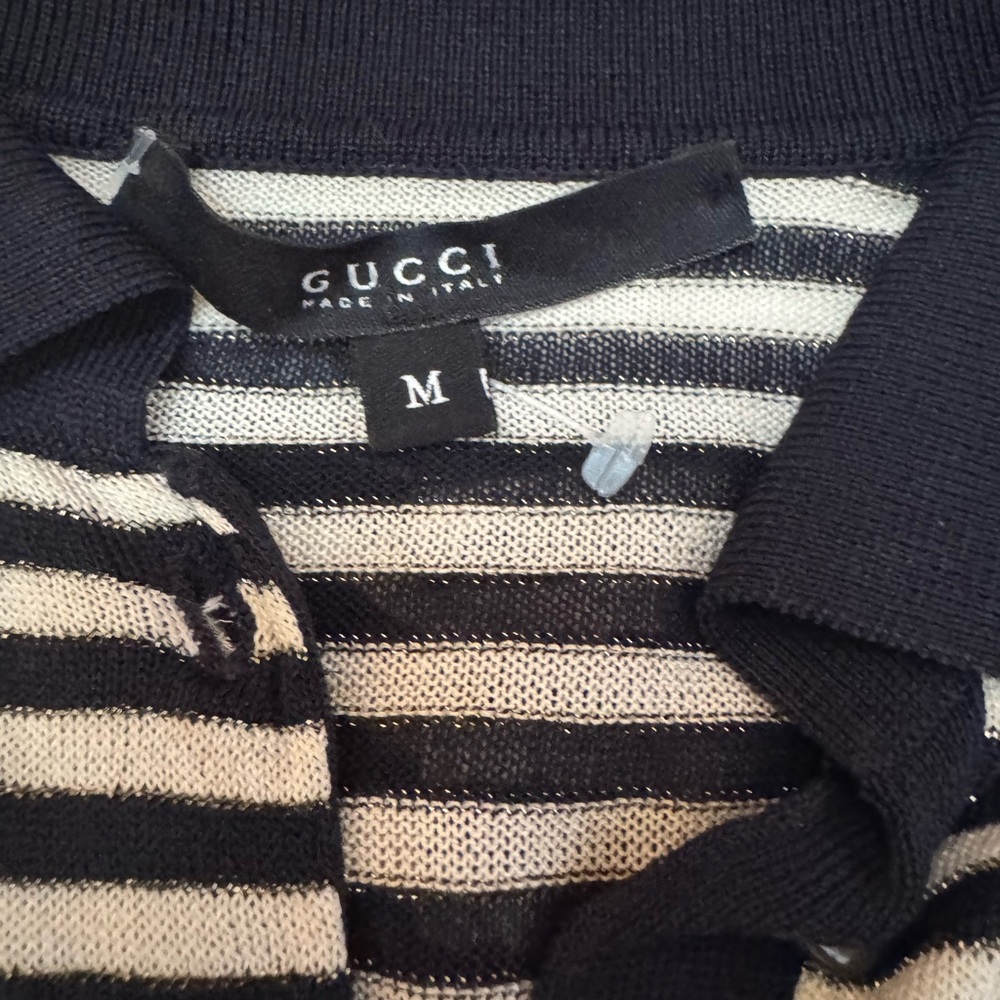 Gucci navy and White Striped short sleeve shirt.
Worn once.